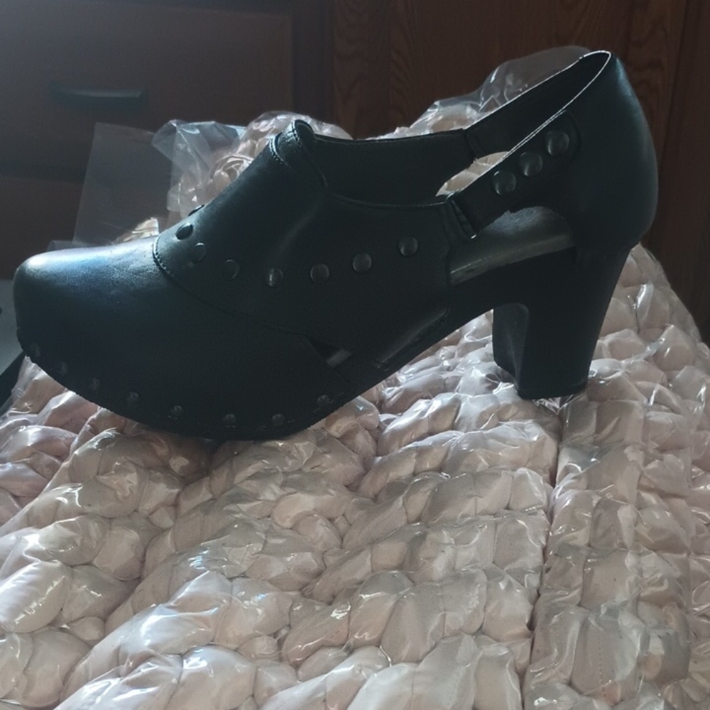 Dansko Black Studded Heeled Mules. New with out tags or box.